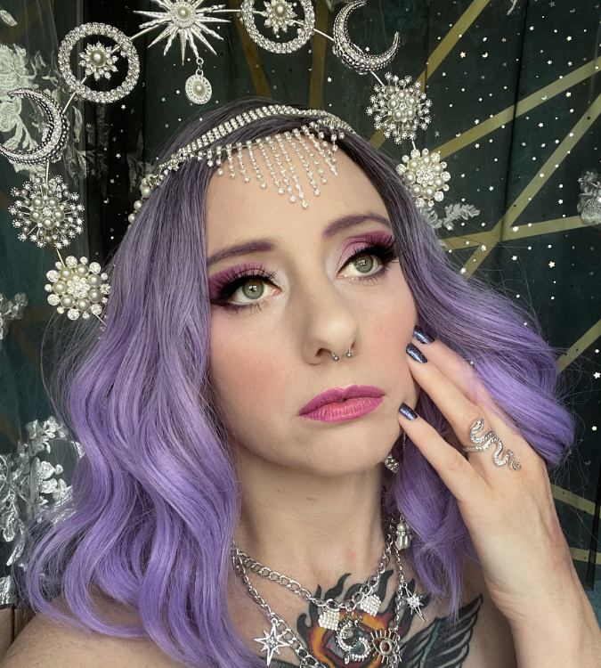 Zela Martin as Celestial High Priestess